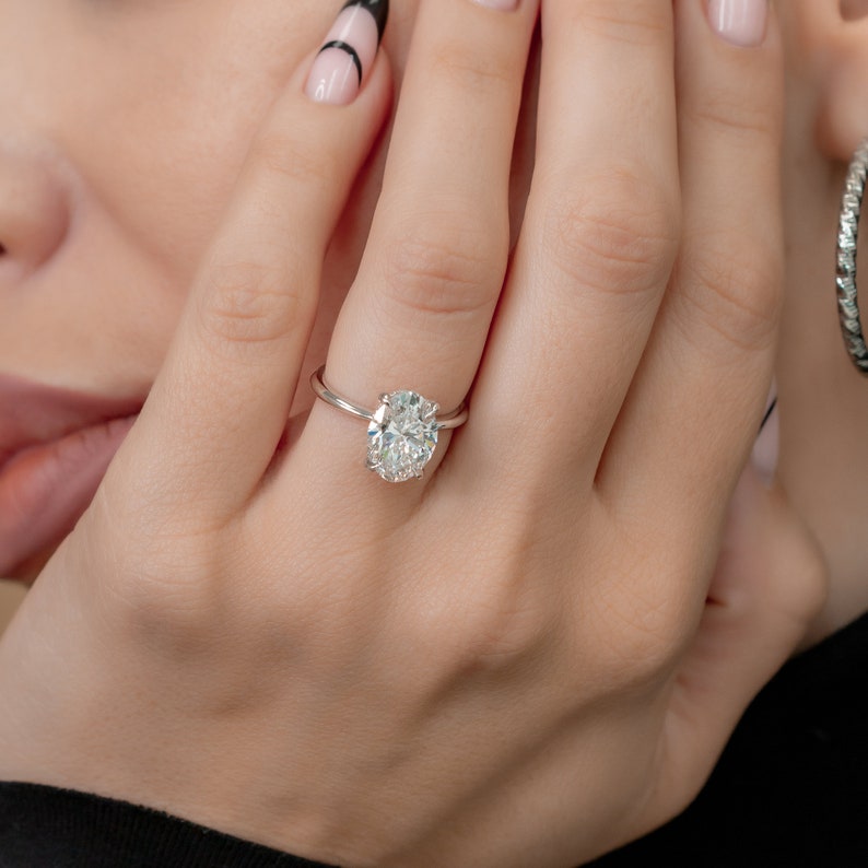 oval-hidden-halo-f-vs2-diamond-engagement-ring