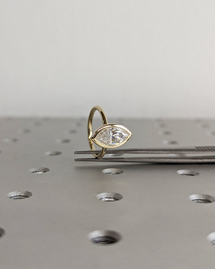 1.50CT Marquise Cut Bezel Set Lab Grown Diamond Engagement Ring For Women
