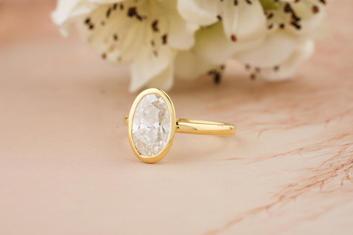 2.50CT Elongated Oval Cut Bezel Set Lab Grown Diamond Engagement Ring For Women