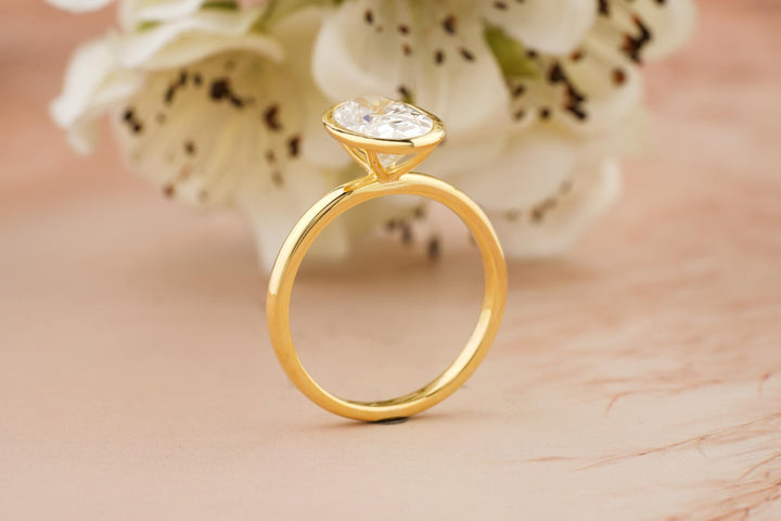2.50CT Elongated Oval Cut Bezel Set Lab Grown Diamond Engagement Ring For Women
