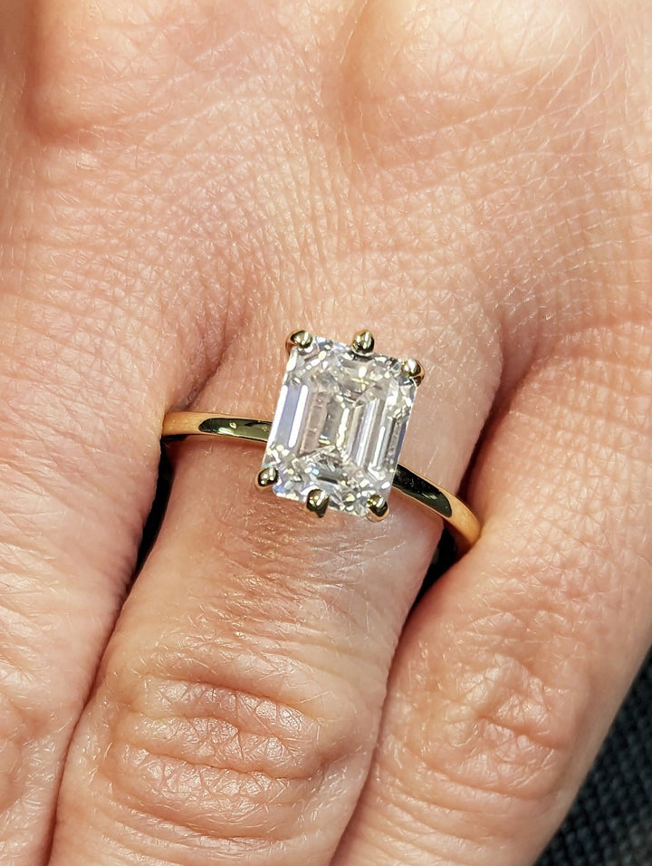 Sparkling emerald cut solitaire ring for special occasions

