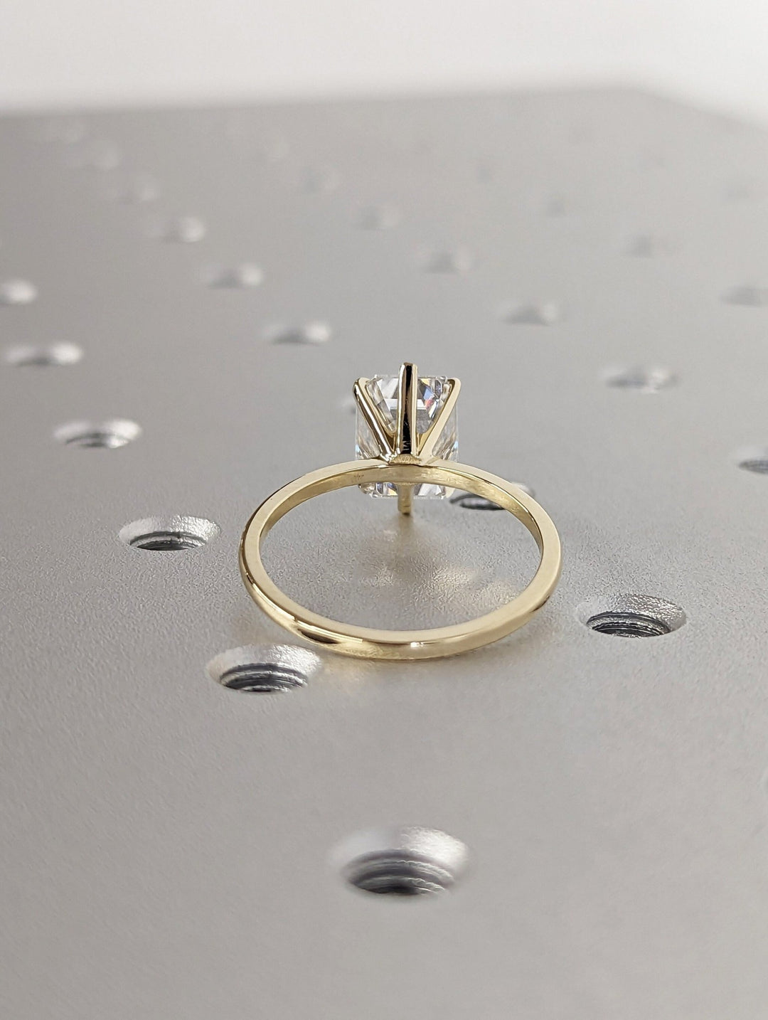 Emerald cut diamond ring with exceptional brilliance

