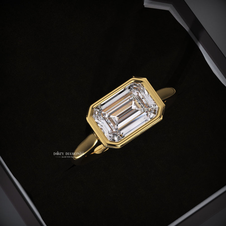 lab grown emerald, bezel set ring, east west diamond ring, engagement ring, sustainable jewelry, ethical engagement ring,