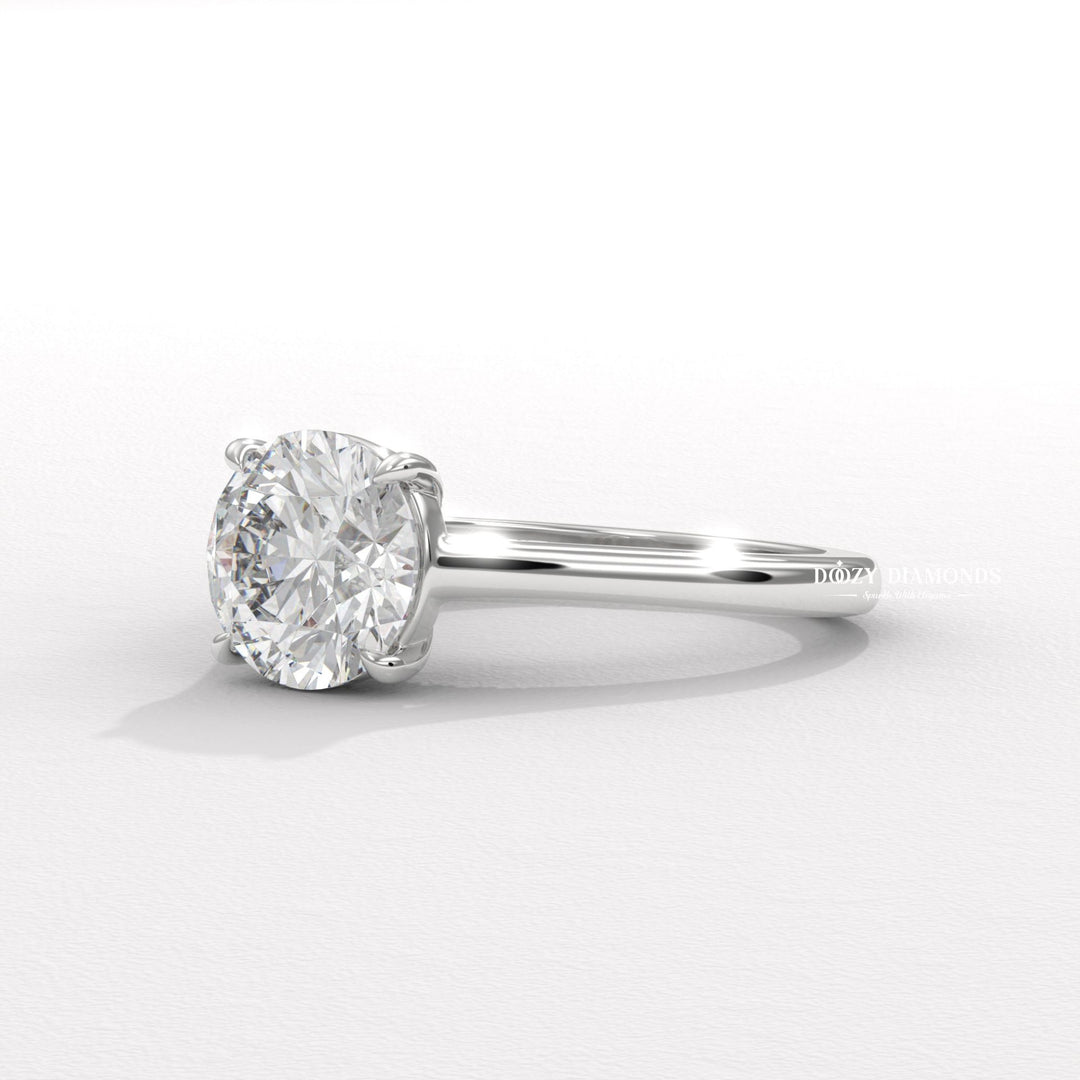 luxury bridal jewelry, women’s engagement jewelry, handcrafted diamond ring, fine jewelry engagement ring, round jewelry ring, proposal diamond ring, contemporary bridal ring,