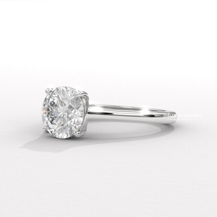 luxury bridal jewelry, women’s engagement jewelry, handcrafted diamond ring, fine jewelry engagement ring, round jewelry ring, proposal diamond ring, contemporary bridal ring,