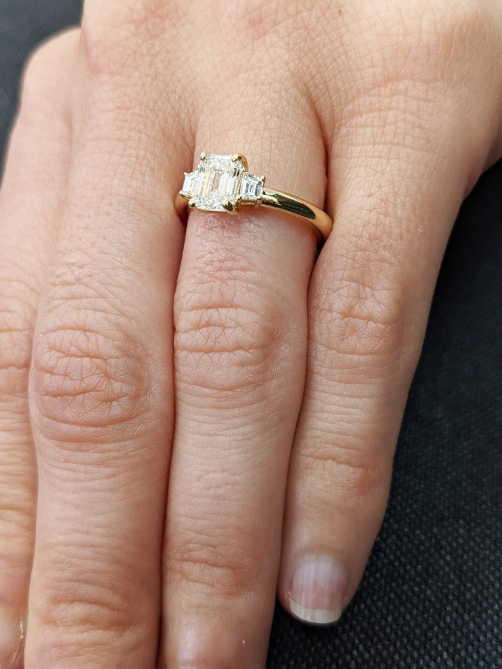 timeless emerald diamond ring,