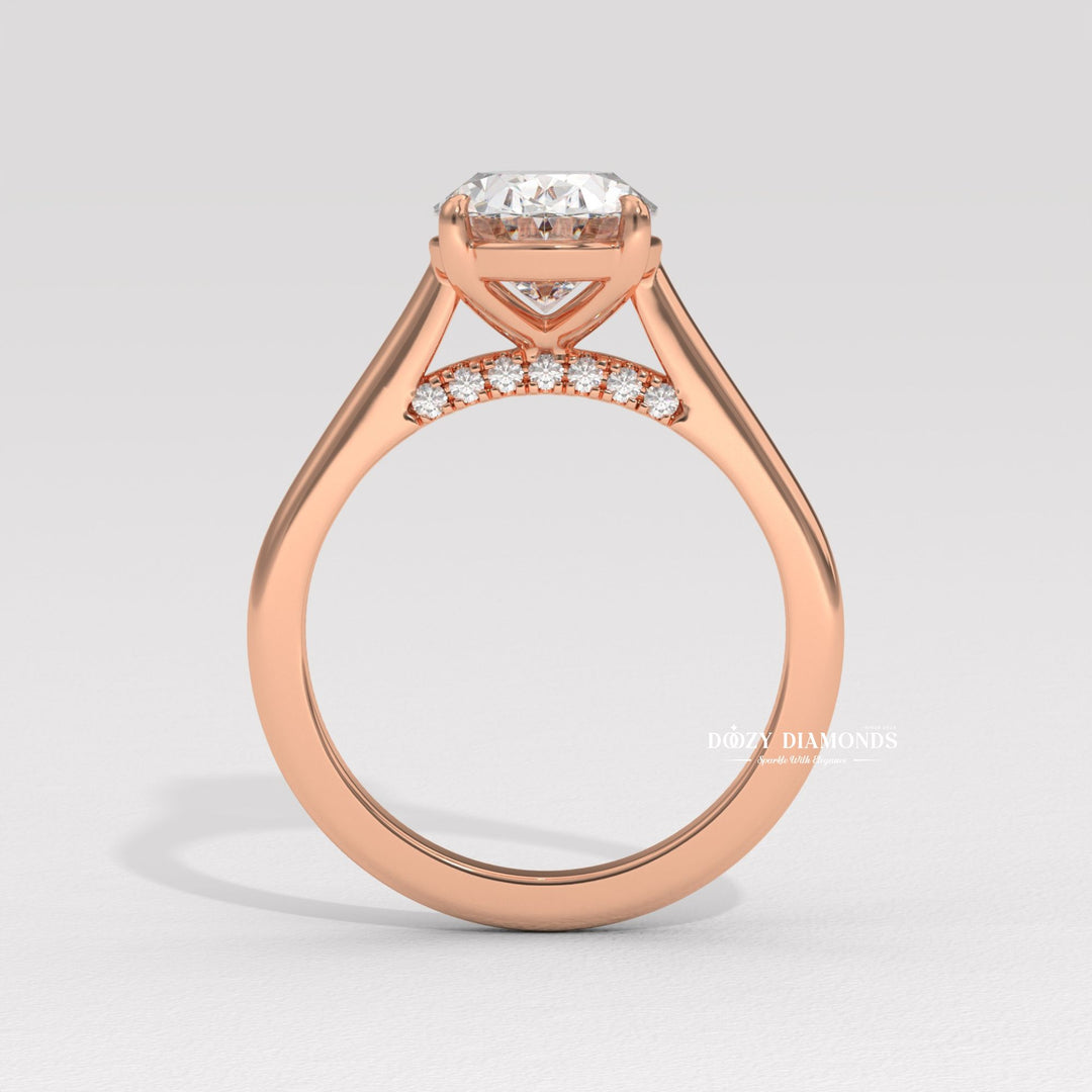 classic solitaire ring, oval diamond solitaire, solitaire engagement ring, micro pave diamond ring, french pave ring, shared prong pave ring, split shank engagement ring, twisted band ring,