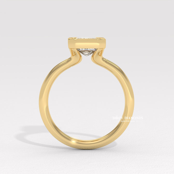 IGI diamond certificate, bezel bridal ring, emerald proposal ring, contemporary diamond ring, secure setting engagement ring, elegant emerald jewelry, premium bridal ring, handcrafted diamond ring,