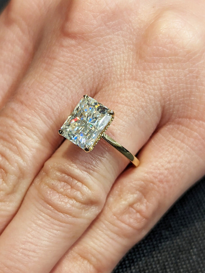 radiant cut center diamond ring,