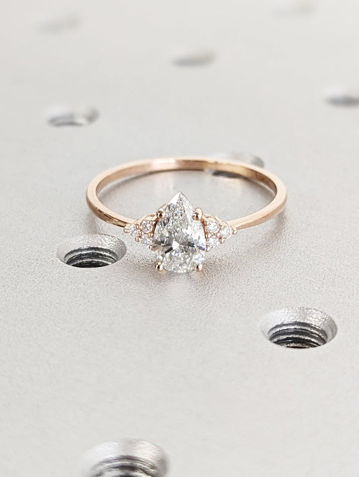 pear cut center stone engagement ring
