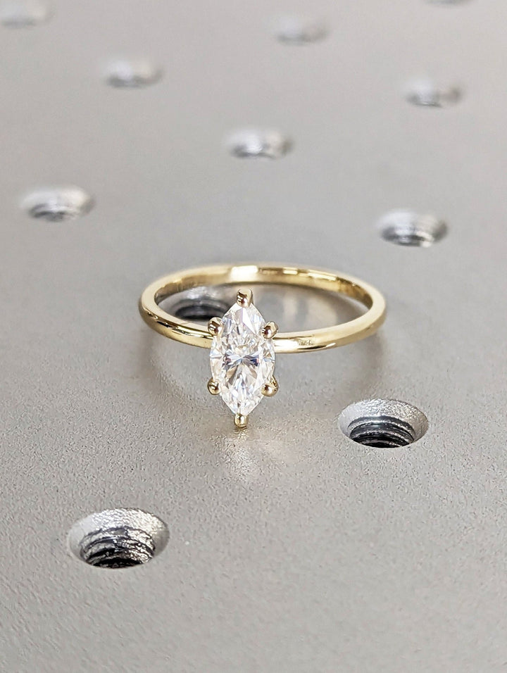 , marquise cut hidden halo ring,
