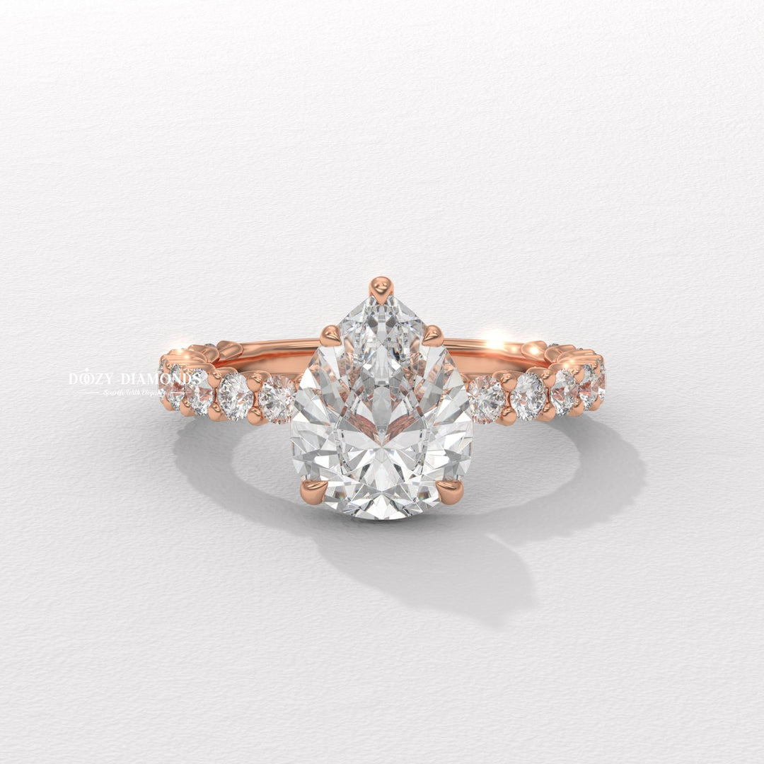 luxury ring for women, premium bridal jewelry, timeless bridal jewelry, elegant bridal jewelry, pear halo ring, pear hidden halo ring, pear pave ring, pear cathedral ring, pear bezel ring