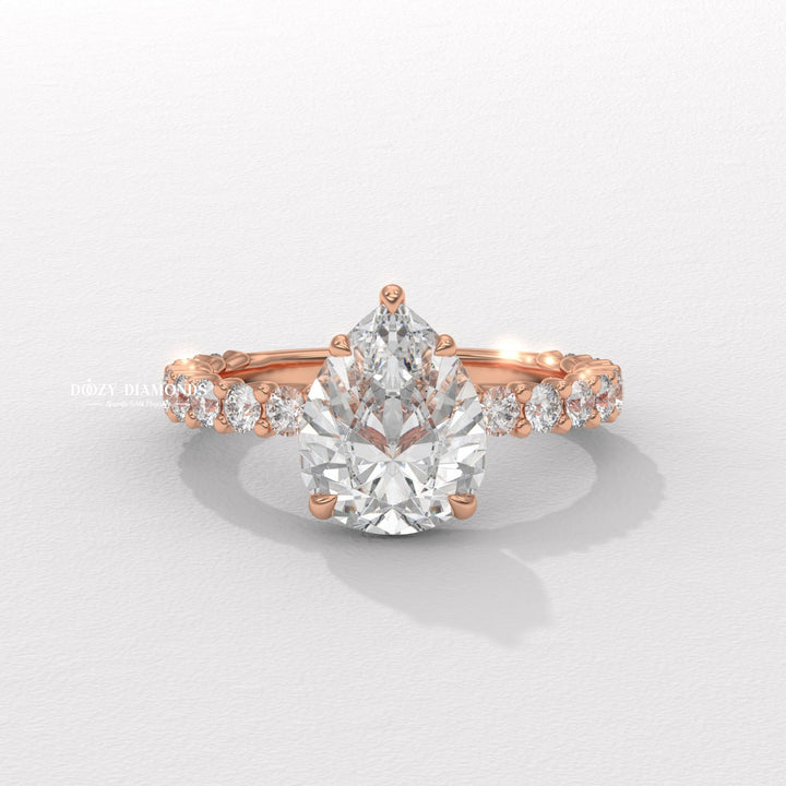 luxury ring for women, premium bridal jewelry, timeless bridal jewelry, elegant bridal jewelry, pear halo ring, pear hidden halo ring, pear pave ring, pear cathedral ring, pear bezel ring
