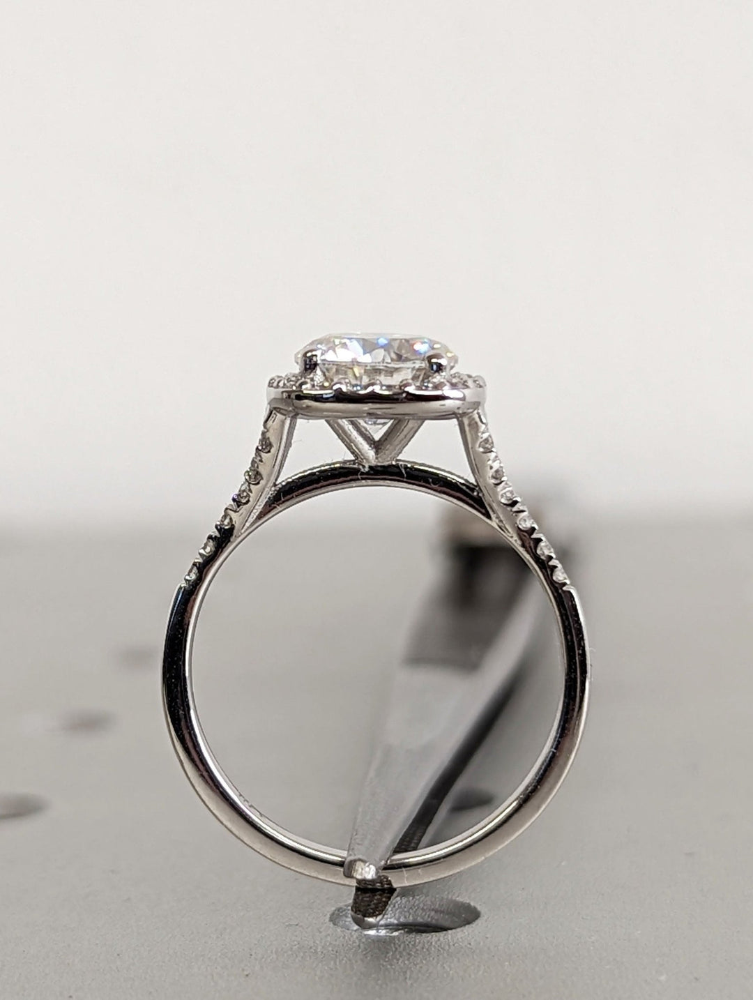 round halo engagement ring with pave setting,