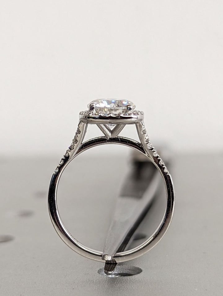 round halo engagement ring with pave setting,