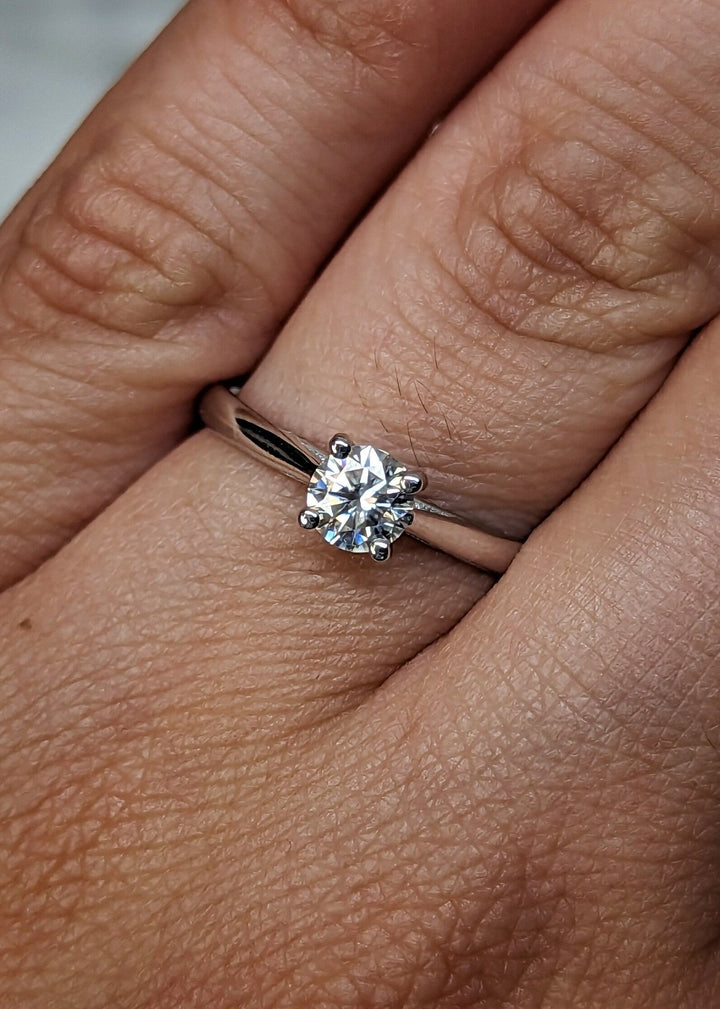Lab created diamond proposal ring with solitaire setting
