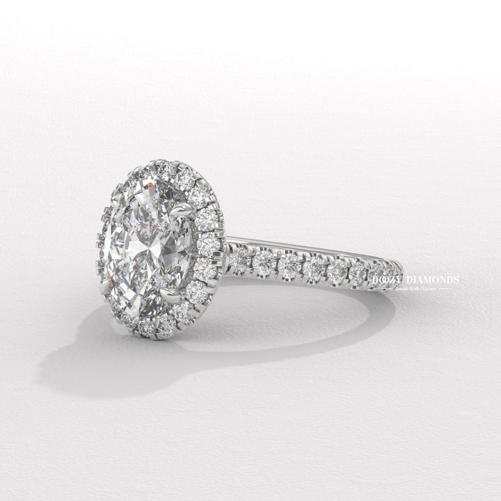 ethical bridal jewelry, modern bridal ring, elegant proposal ring, sustainable luxury jewelry, fine diamond engagement ring, bridal halo diamond ring, romantic proposal jewelry, classic oval halo ring, luxury lab diamond engagement ring, oval wedding ring.
