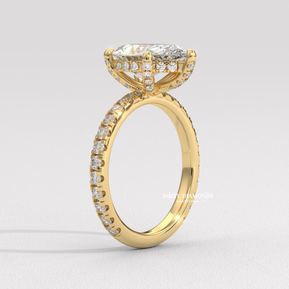 pear center stone ring, teardrop diamond ring, engagement jewelry, bridal accessories, luxury bridal ring, handcrafted engagement ring, fine diamond jewelry, sparkling diamond ring,