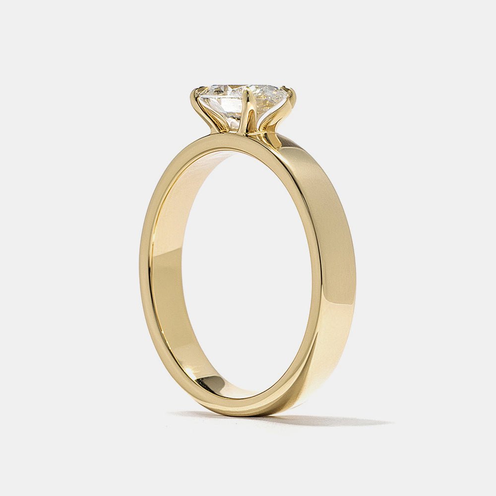 modern luxury ring, elegant bridal ring, designer oval ring, oval statement ring, sophisticated bridal ring, contemporary luxury ring, unique proposal ring, luxury love ring.