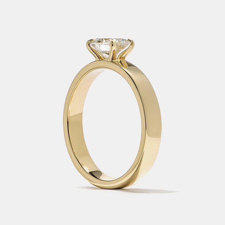 modern luxury ring, elegant bridal ring, designer oval ring, oval statement ring, sophisticated bridal ring, contemporary luxury ring, unique proposal ring, luxury love ring.