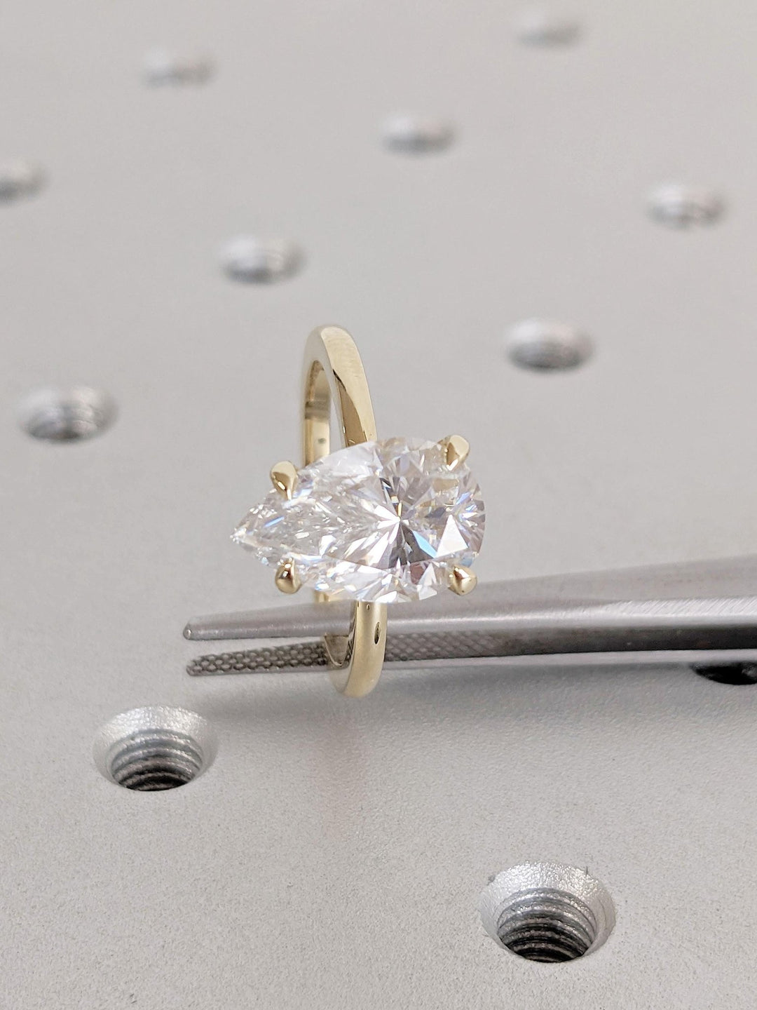 pear cut bridal ring with hidden halo,