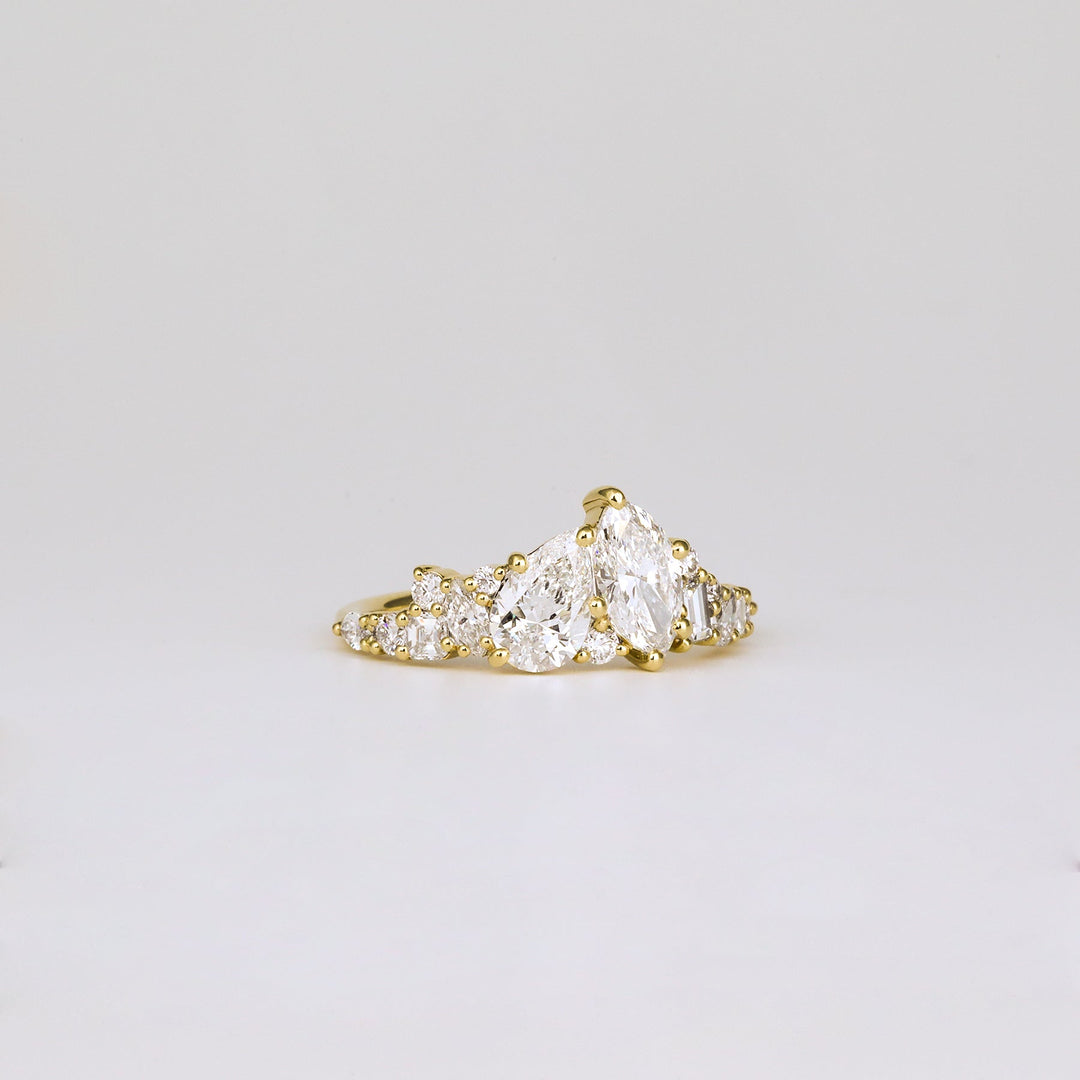 luxury two stone ring, marquise proposal ring, pear proposal ring, engagement ring for her, bridal jewelry, luxury jewelry gift, modern romance ring, artisan engagement ring, handcrafted luxury ring, premium bridal jewelry, luxury romance jewelry, timeless bridal ring, luxury heirloom ring, exclusive diamond ring, fine luxury jewelry, handcrafted proposal ring,