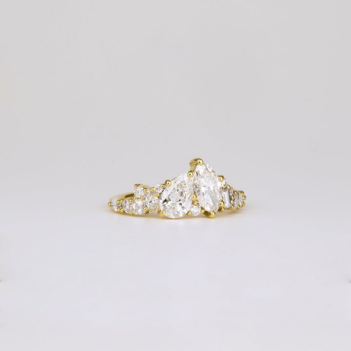 luxury two stone ring, marquise proposal ring, pear proposal ring, engagement ring for her, bridal jewelry, luxury jewelry gift, modern romance ring, artisan engagement ring, handcrafted luxury ring, premium bridal jewelry, luxury romance jewelry, timeless bridal ring, luxury heirloom ring, exclusive diamond ring, fine luxury jewelry, handcrafted proposal ring,