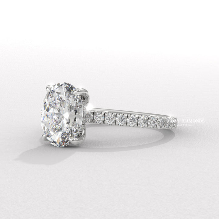 oval solitaire engagement ring, oval bezel ring, oval prong set ring, four prong engagement ring