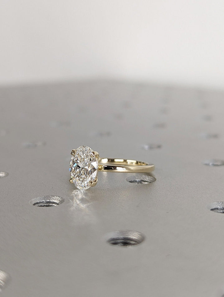 , luxurious oval diamond ring,