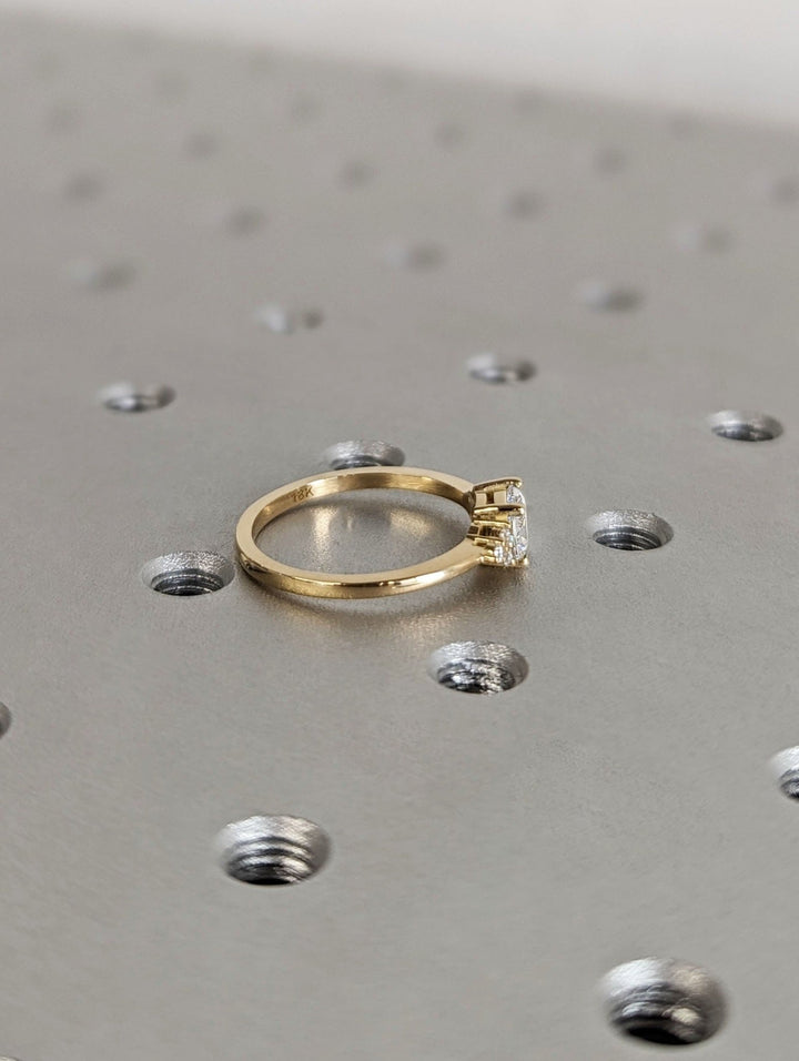 modern east west diamond engagement ring,