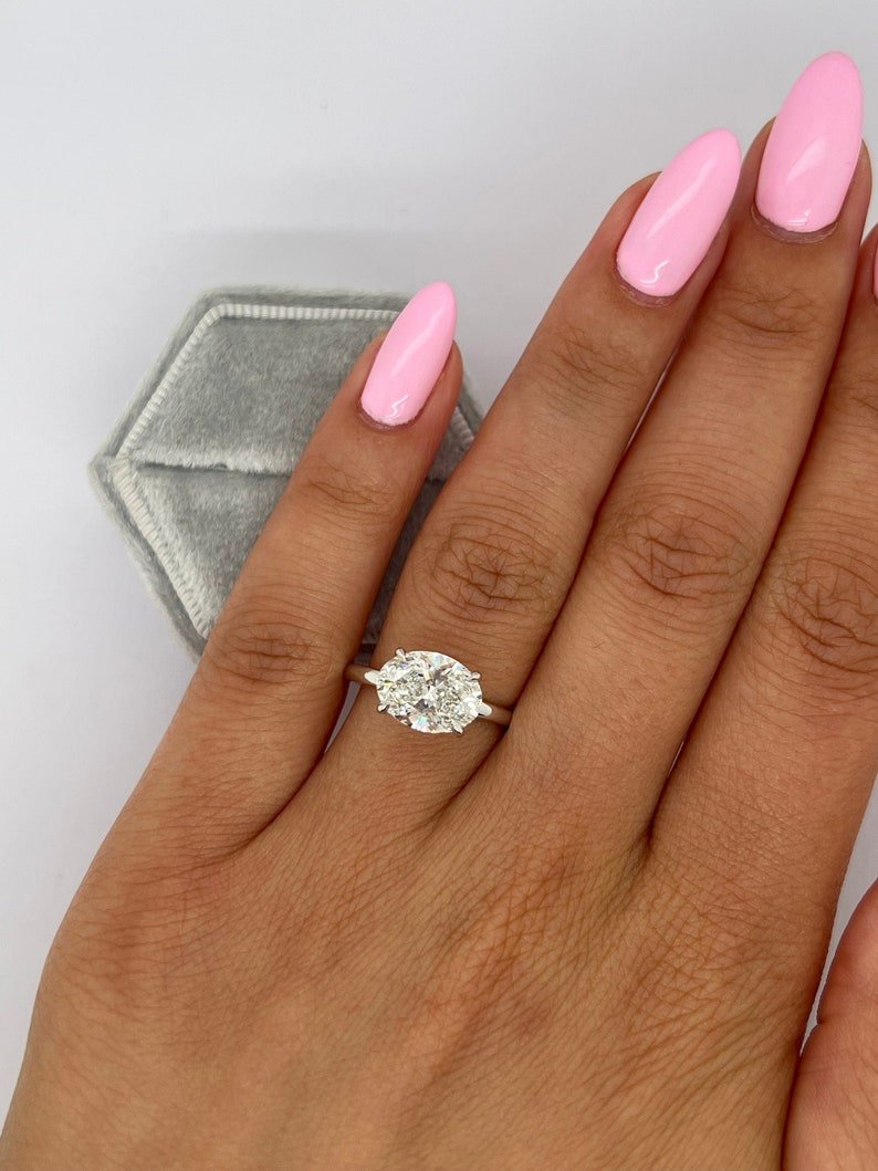 designer oval diamond engagement ring,