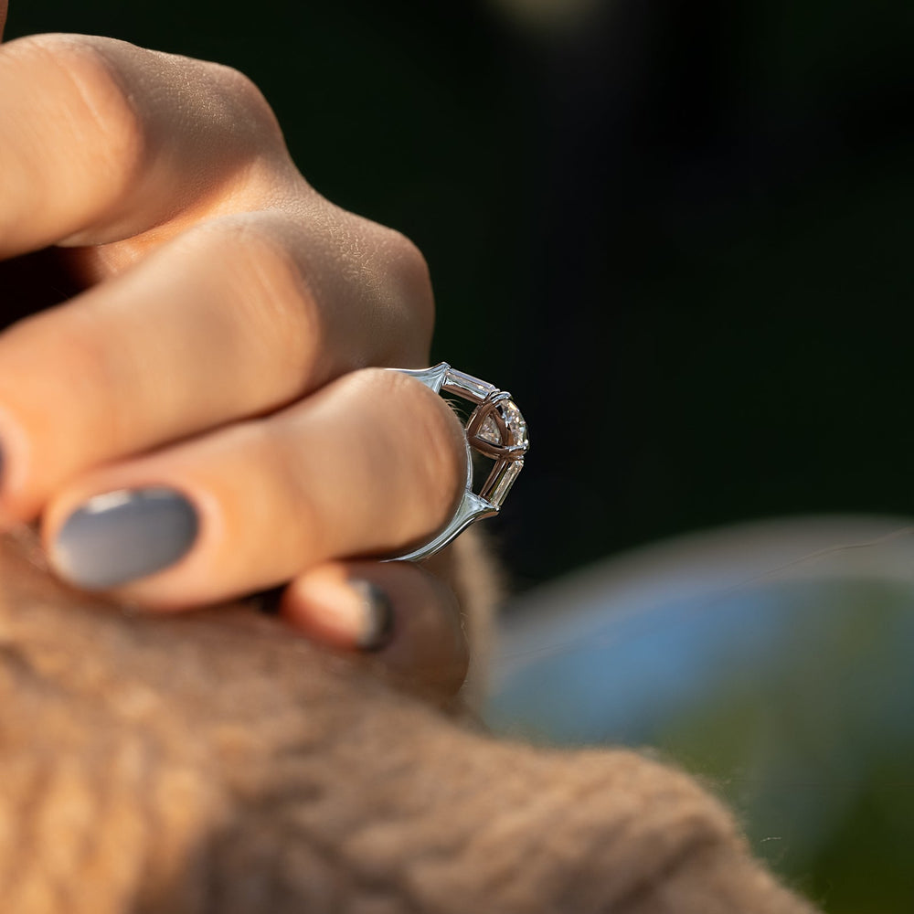 oval trilogy diamond engagement ring