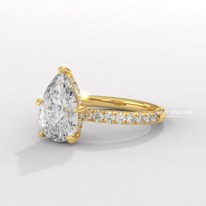 elegant bridal jewelry, luxury ring for women, engagement jewelry, sparkling bridal ring, heirloom style ring, teardrop diamond ring, unique engagement ring, bridal diamond ring