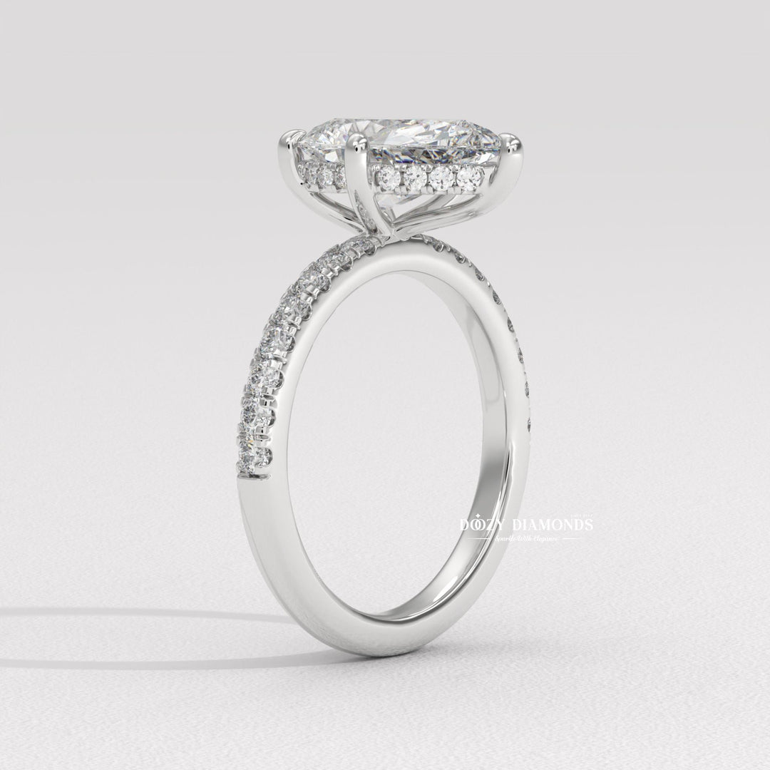 fine diamond jewelry, bridal accessories, wedding proposal ring, forever love ring, pear center stone ring, designer engagement ring, elegant bridal jewelry, luxury ring for women, engagement jewelry, sparkling bridal ring, heirloom style ring, teardrop diamond ring, unique