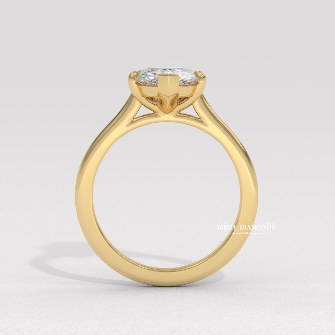 pear shape engagement ring, solitaire pear diamond ring, elongated diamond ring, luxury pear ring, elegant pear diamond, bridal solitaire ring, diamond proposal ring, wedding engagement jewelry