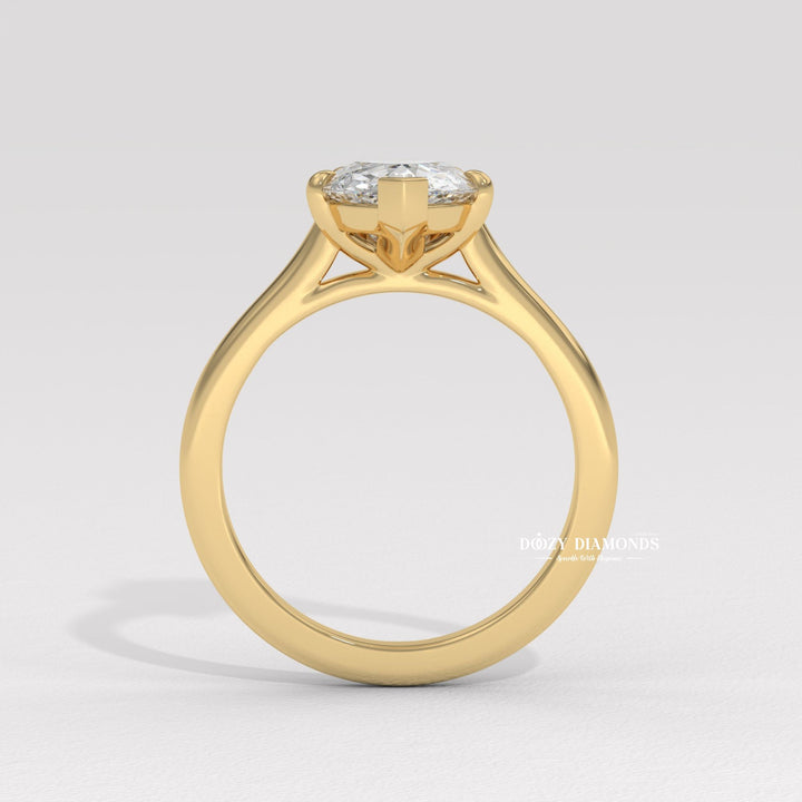 pear shape engagement ring, solitaire pear diamond ring, elongated diamond ring, luxury pear ring, elegant pear diamond, bridal solitaire ring, diamond proposal ring, wedding engagement jewelry