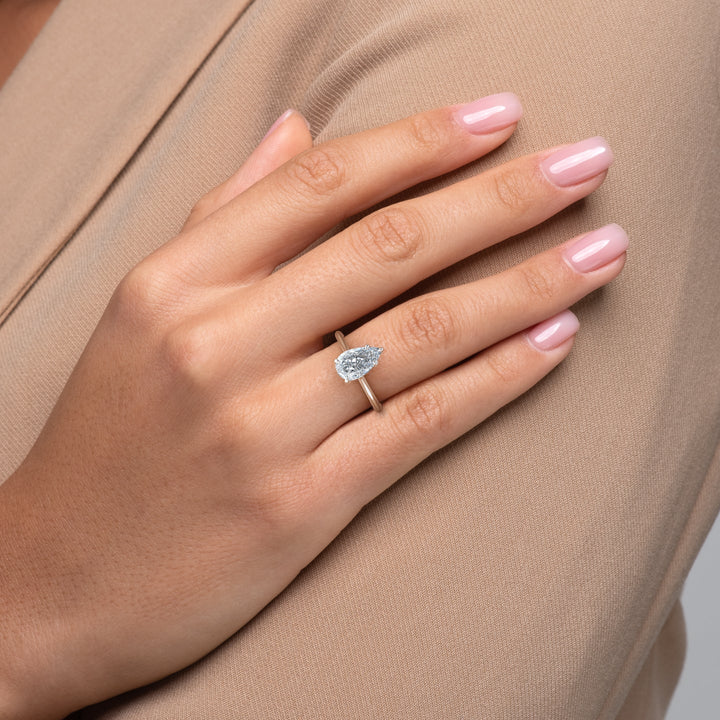 pear solitaire diamond ring,