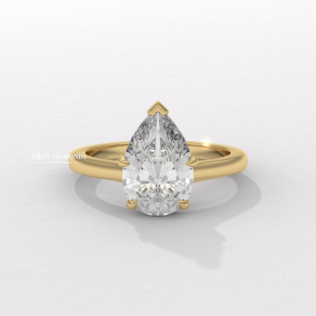 pear diamond solitaire, teardrop diamond ring, pear lab grown diamond, pear lab diamond ring, pear shape engagement ring, solitaire pear diamond ring, elongated diamond ring, luxury pear ring,