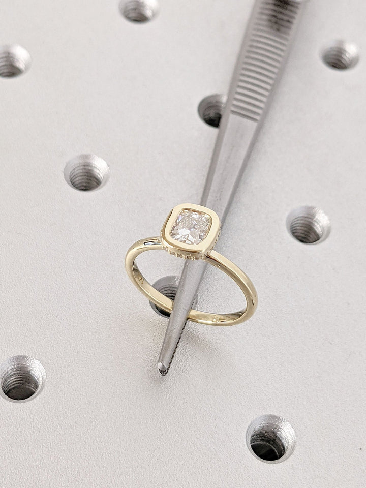 0.50 Carat Cushion Cut Bezel Set Diamond Engagement Ring