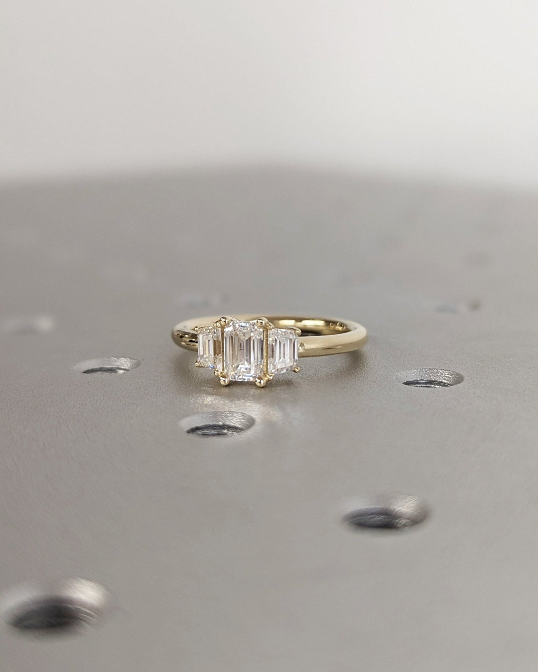 emerald cut diamond ring with symbolic meaning,