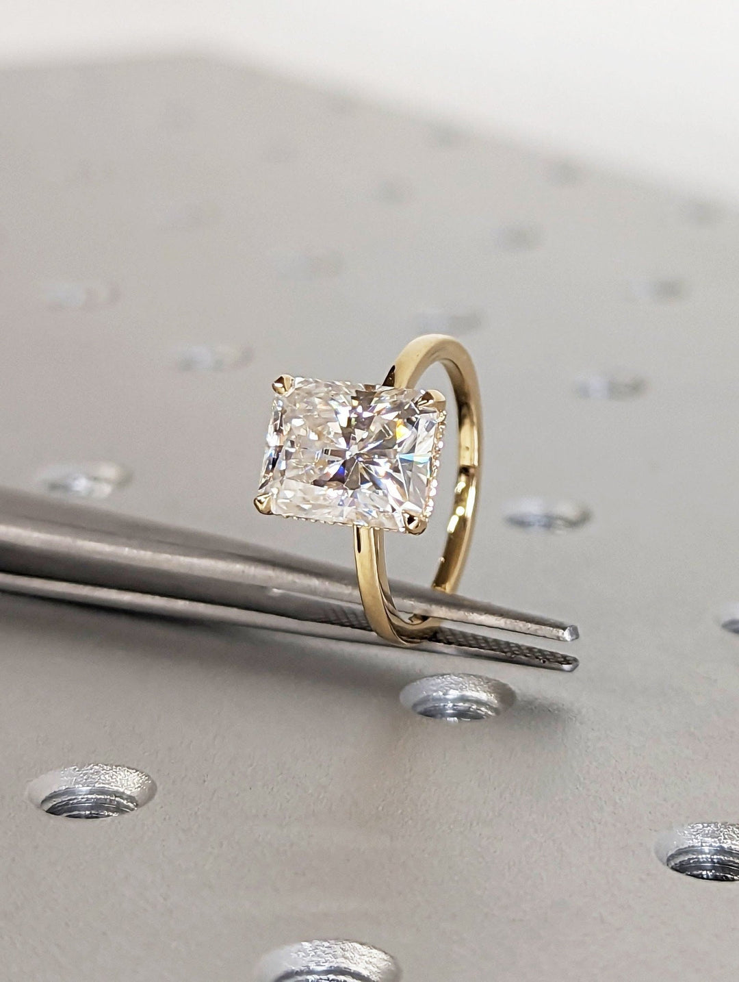 radiant center stone ring,