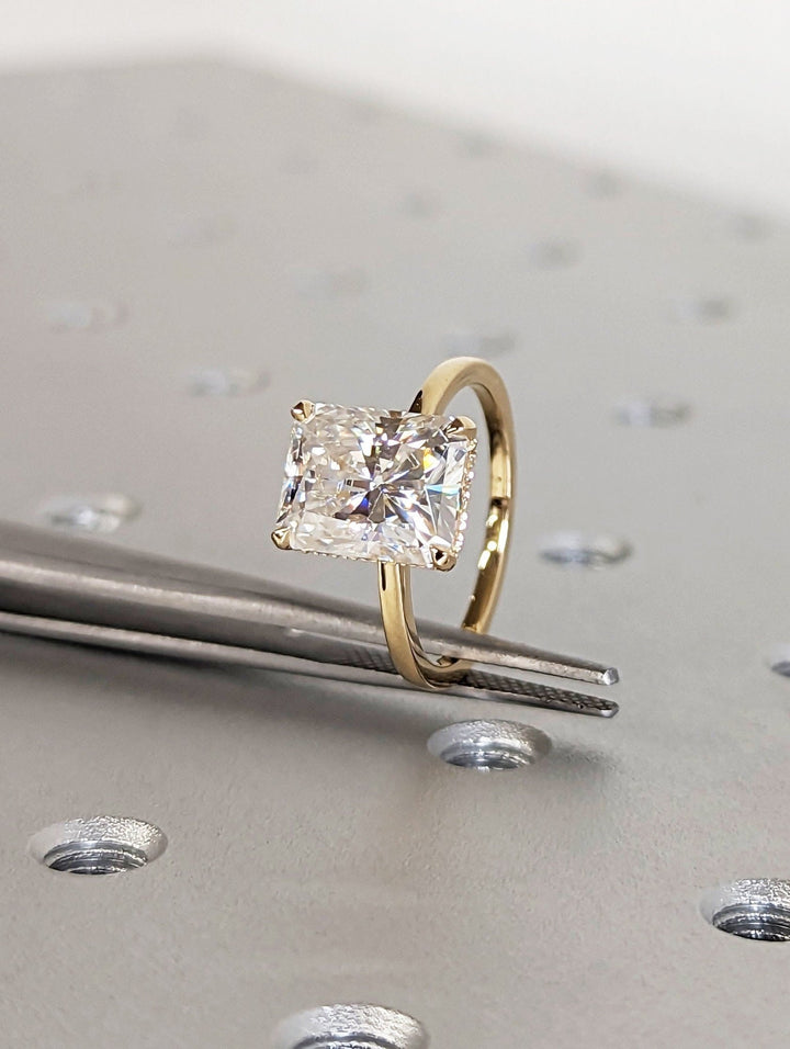 radiant center stone ring,