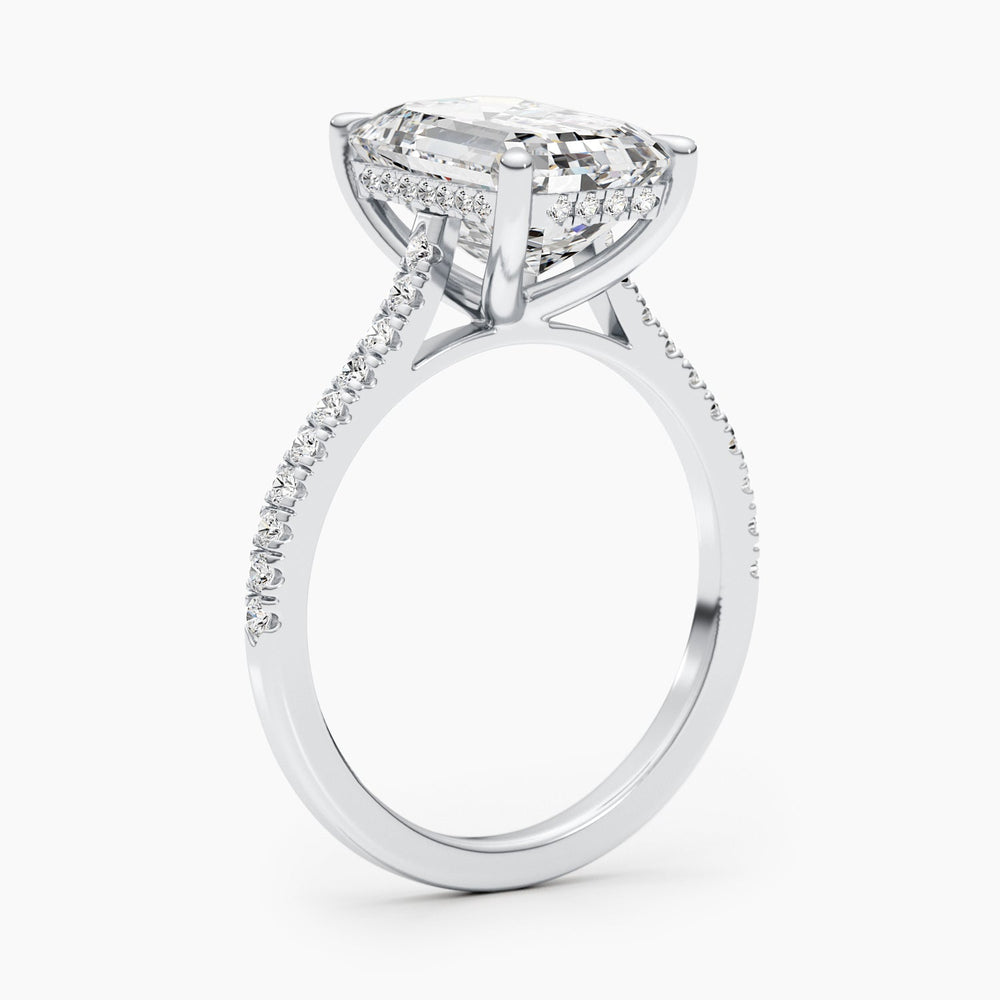 elongated emerald diamond ring