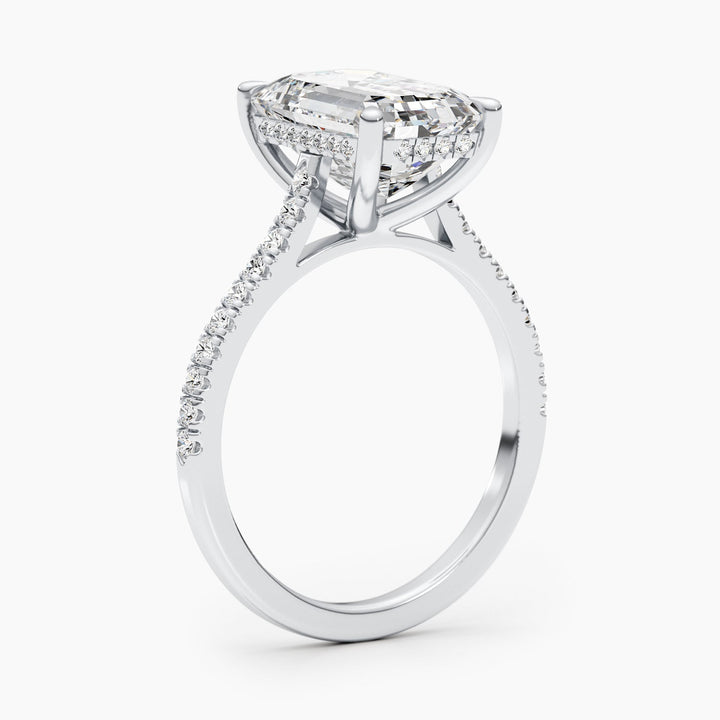 elongated emerald diamond ring