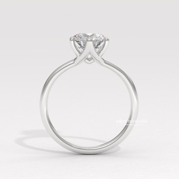 Simple Minimalist Diamond Ring
14. Timeless Round Cut Engagement Ring
15. 4-Prong Solitaire White Gold