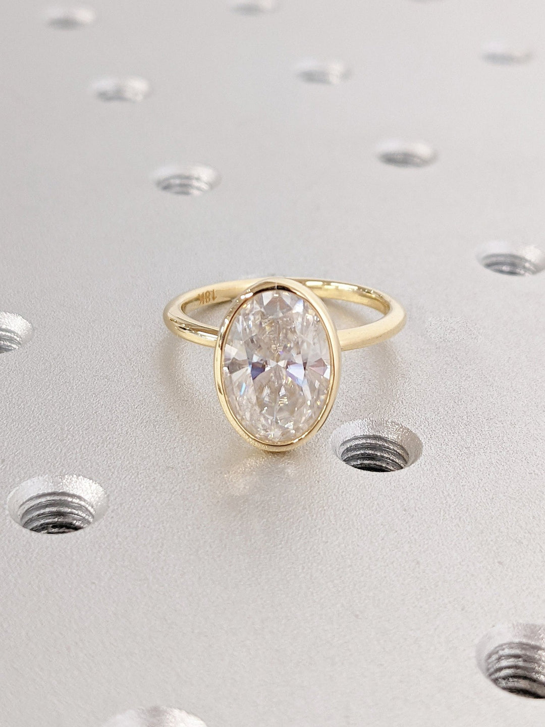 engagement ring with sleek bezel design