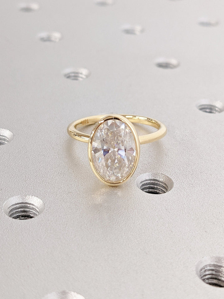 engagement ring with sleek bezel design