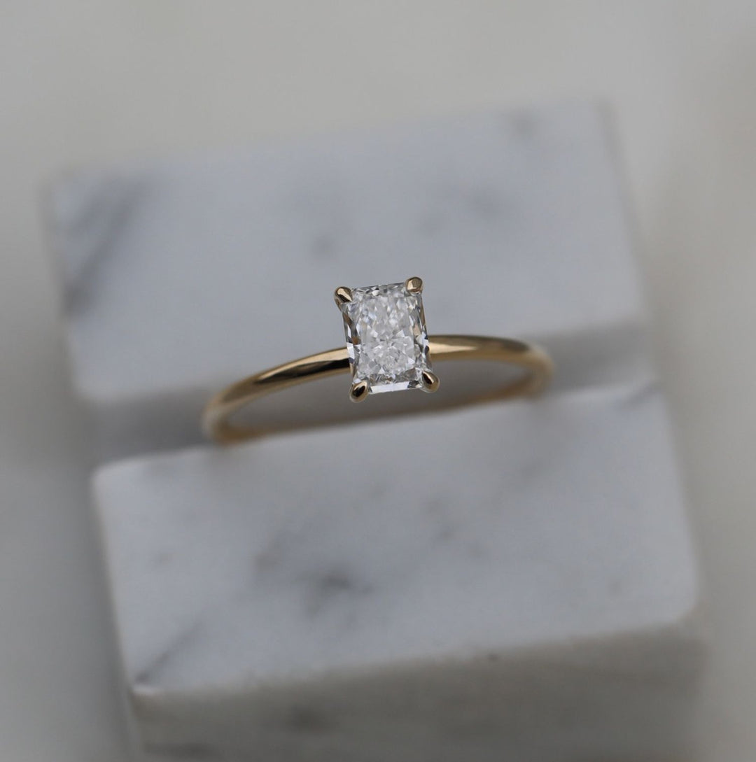 radiant solitaire engagement ring,