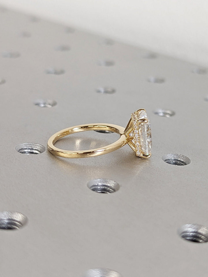 radiant center stone ring,