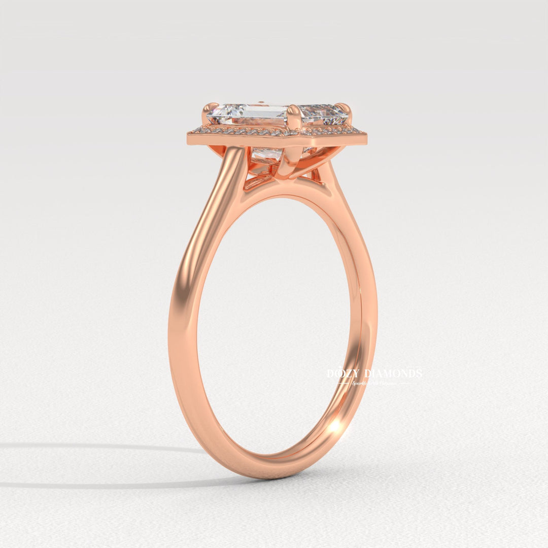 Emerald cut white gold engagement ring
Emerald cut rose gold halo ring
Emerald diamond platinum channel set
